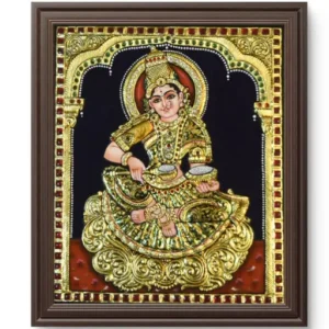 Goddess Annapoorneshwari holding bowl of grains and ladle