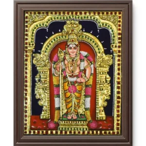 Murugan idol with vibrant garb and in temple