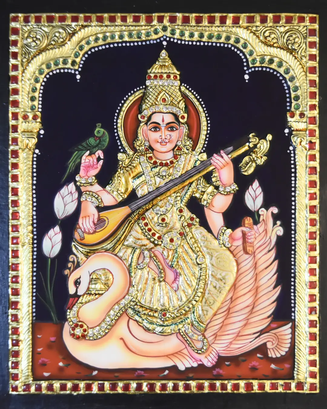sharada devi tanjore painting (copy) Sharada Devi (form of Saraswati) in serene pose with lotus and musical instrument, symbolizing education and creativity
