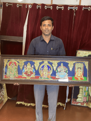 Smiling client with beautiful Tanjore painting