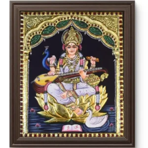 Sharada Devi seated on lotus holding veena and book, Hindu goddess of knowledge and learning.